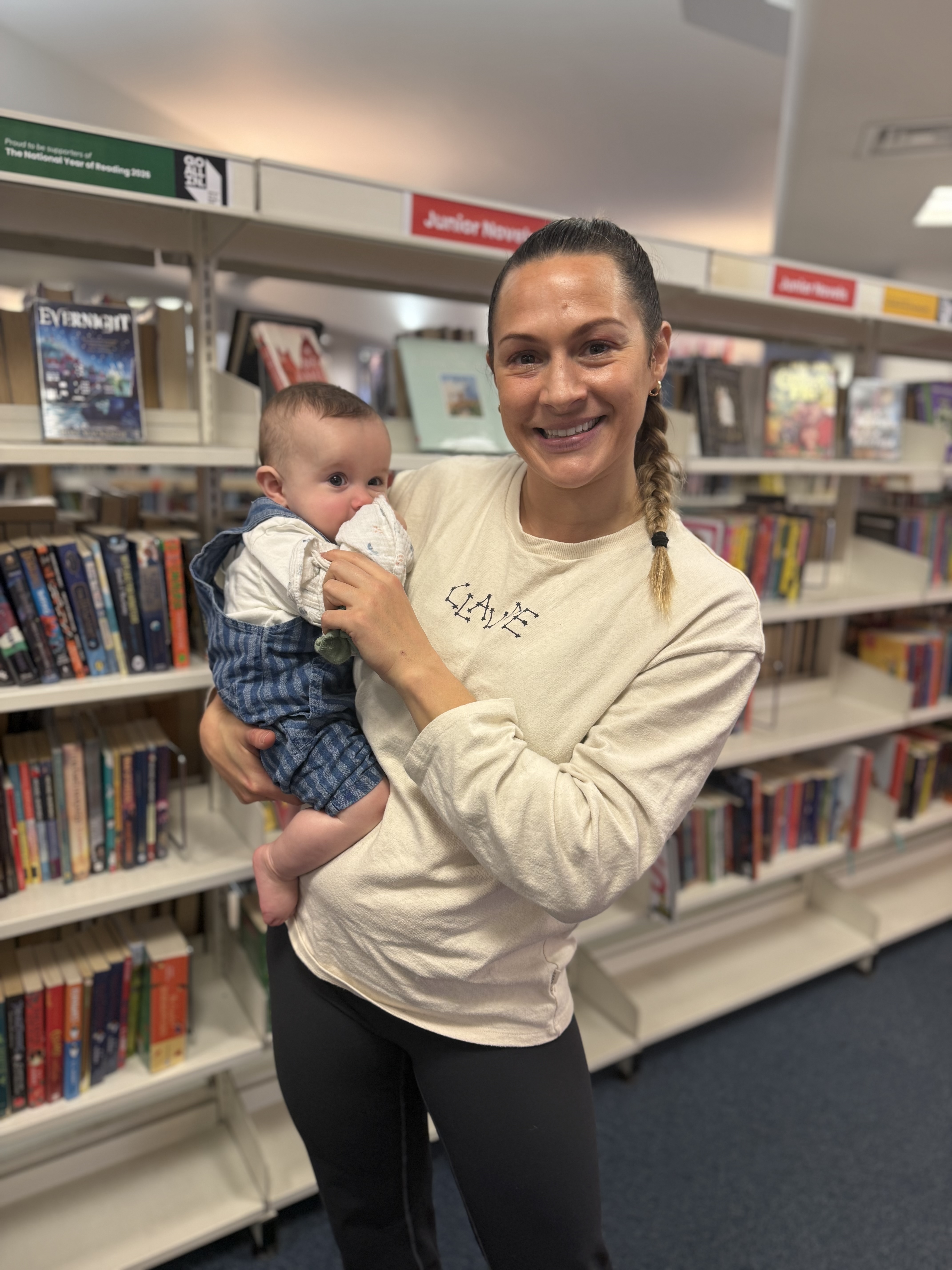 Georgina in the library holding baby Saxon