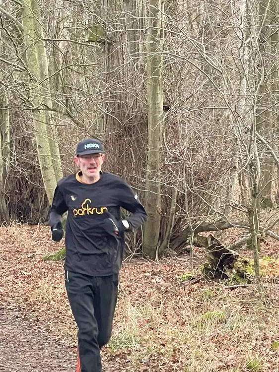 Jonathon Bates running in the Thornham parkrun