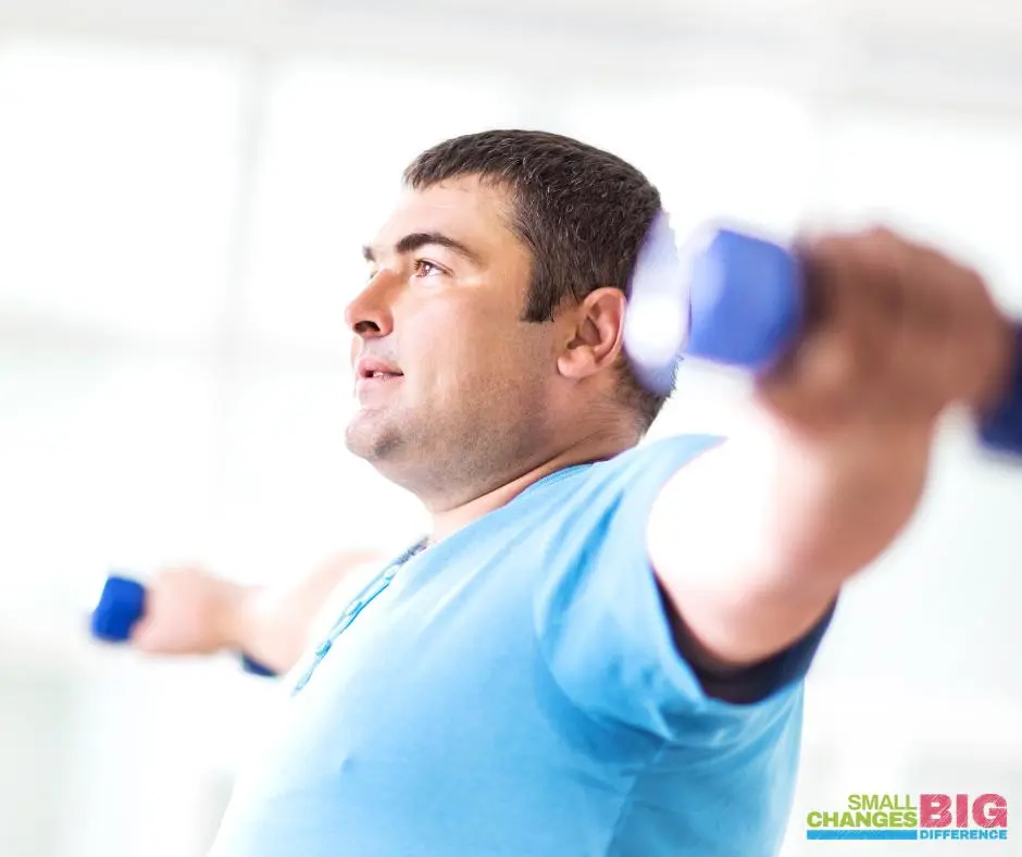 Man lifting small blue weights