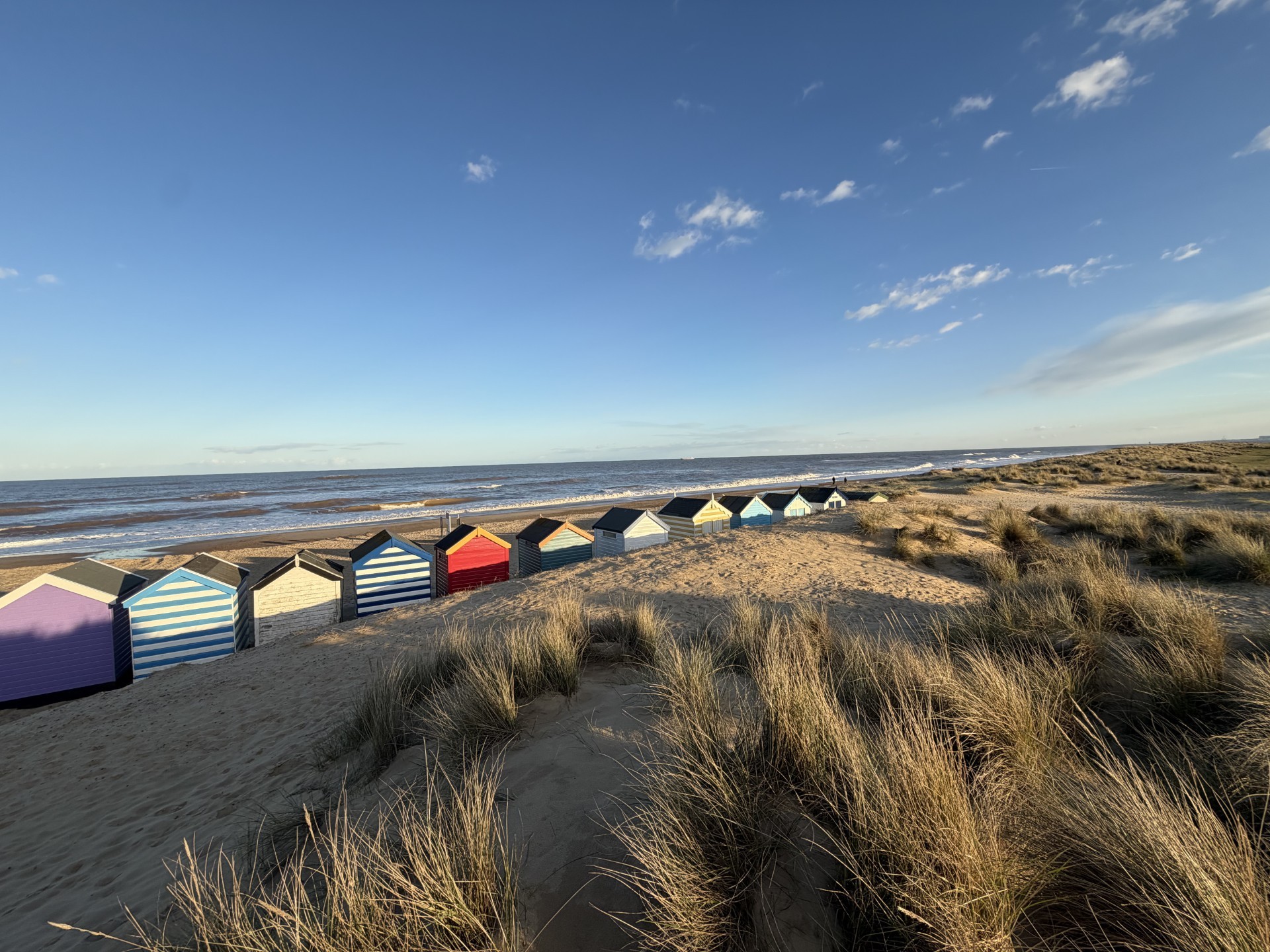 Sandy beach with huts in Southwold